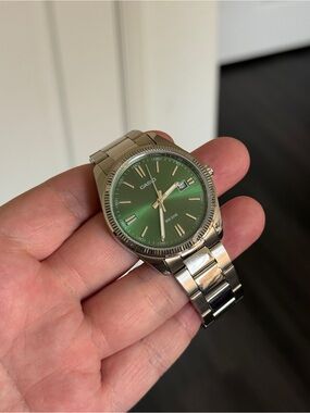 Casio Silver Watch with Green Dial